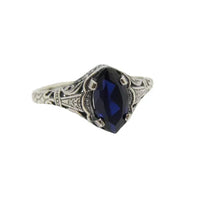 Zilveren vintage ring met blauwe marquise edelsteen