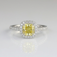 Zilveren ring met gele edelsteen en halo