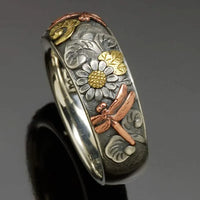 Zilveren vintage ring met zonnebloem en libelle