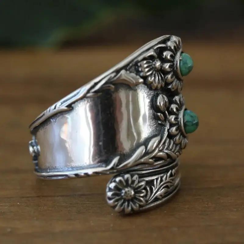 Zilveren vintage lepelring met turquoise zonnebloemen