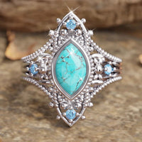 Zilveren vintage ring met marquise turkoois en blauwe steentjes