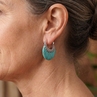 Zilveren bohemian oorbellen met turquoise schijf