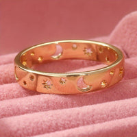 Gouden ringenset met zon, maan en sterren