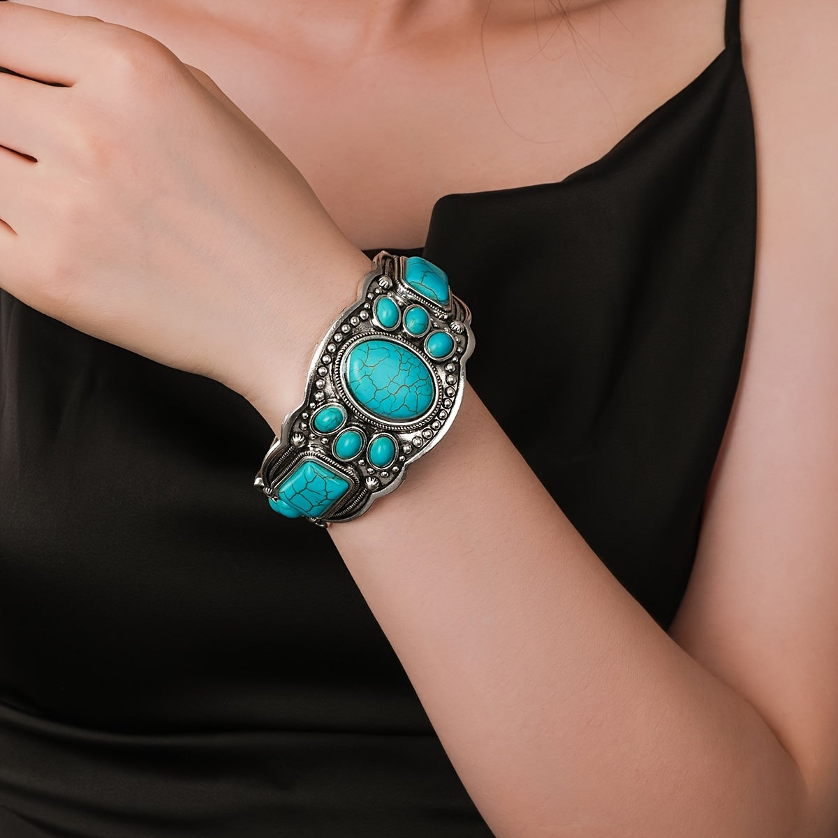Gouden oorbellen met turquoise druppelsteen