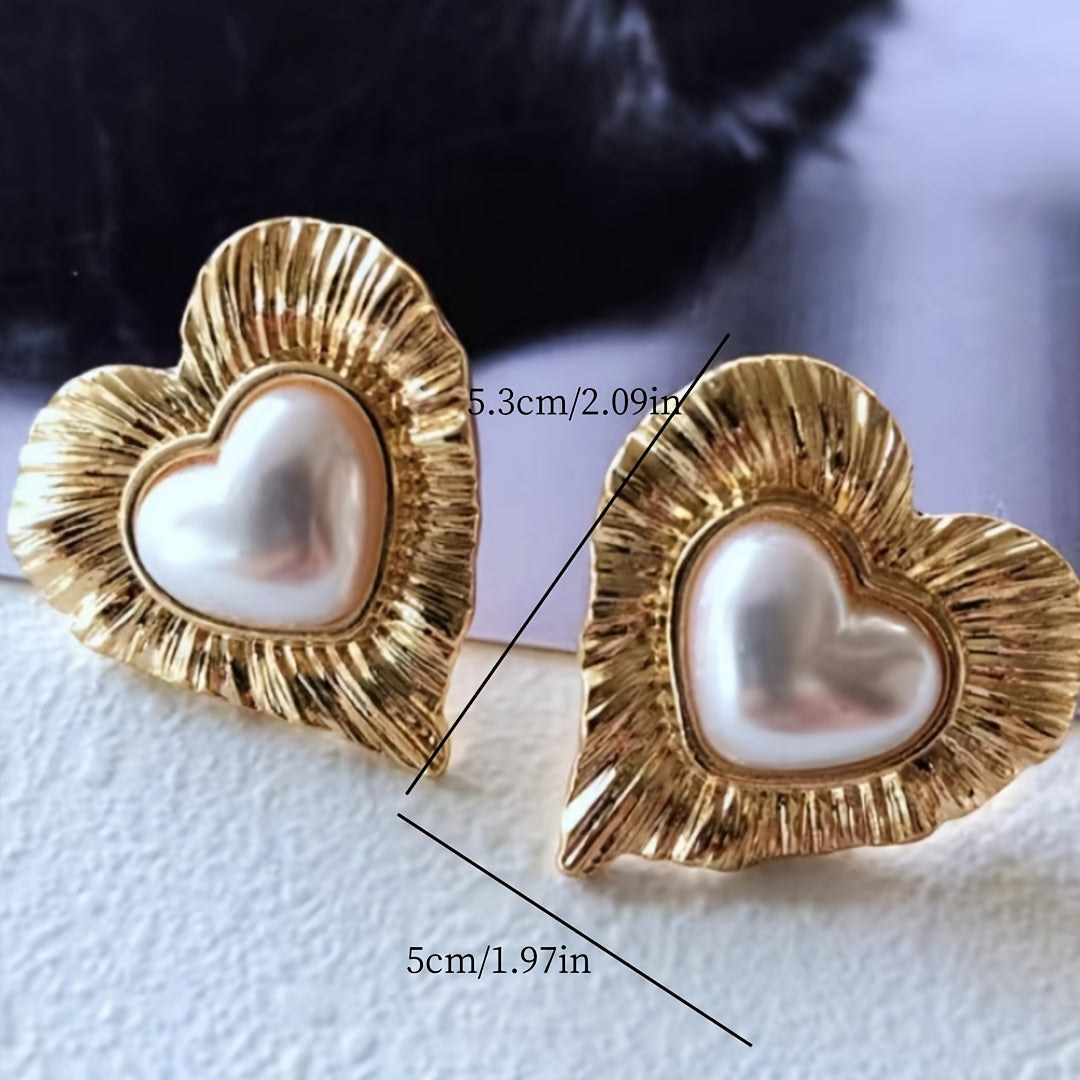 Gouden vintage hartoorbellen met parel