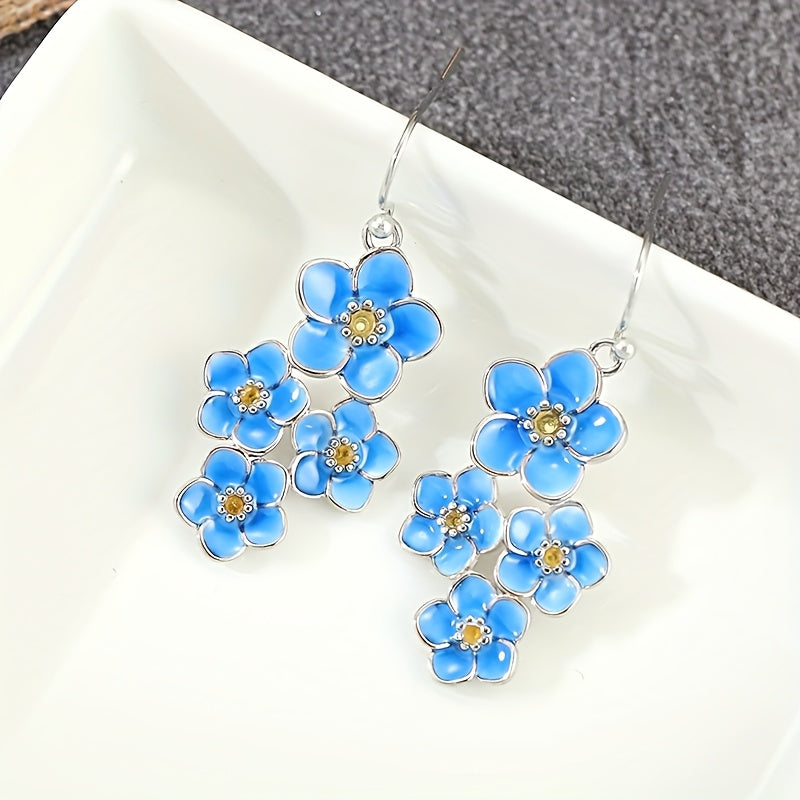 Zilveren oorbellen met blauwe emaille bloemen