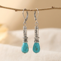Zilveren vintage oorbellen met turquoise druppel