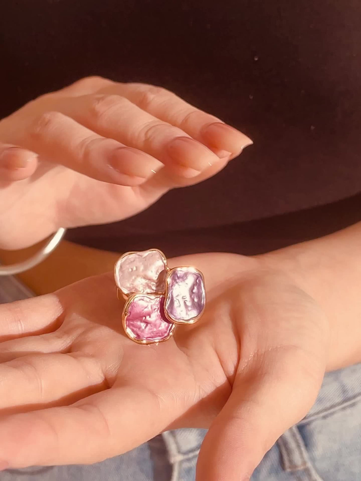 Roségouden ring met roze en paarse edelstenen