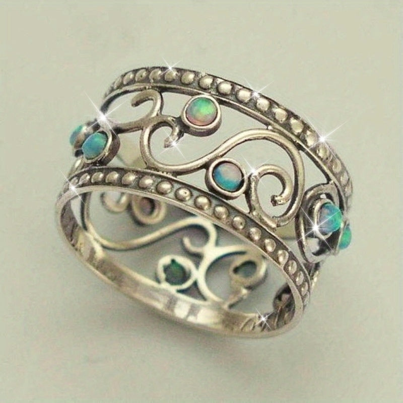 Zilveren bohemian ring met turquoise opaal
