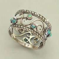 Zilveren bohemian ring met turquoise opaal