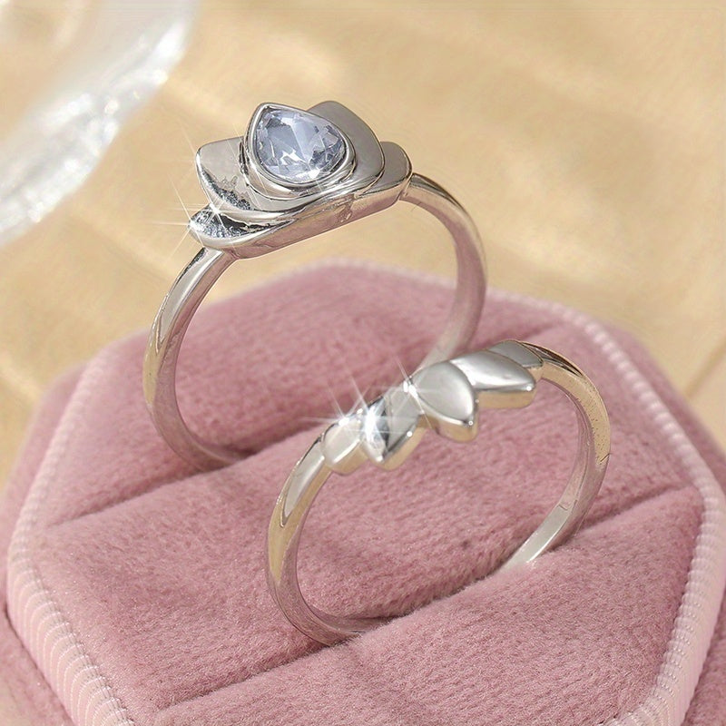 Zilveren lotusring met druppelvormige blauwe steen