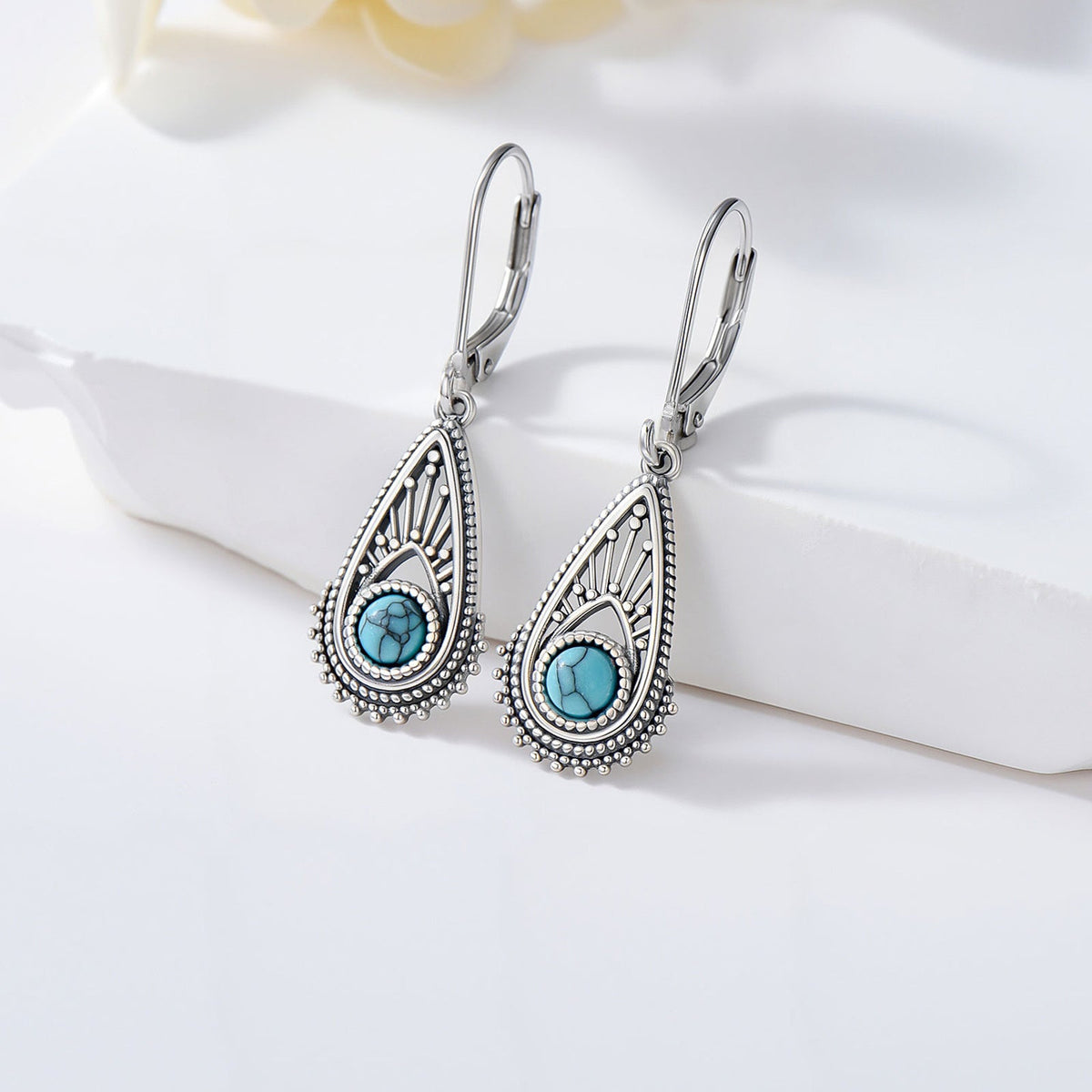 Zilveren vintage filigraan oorbellen met turquoise druppel