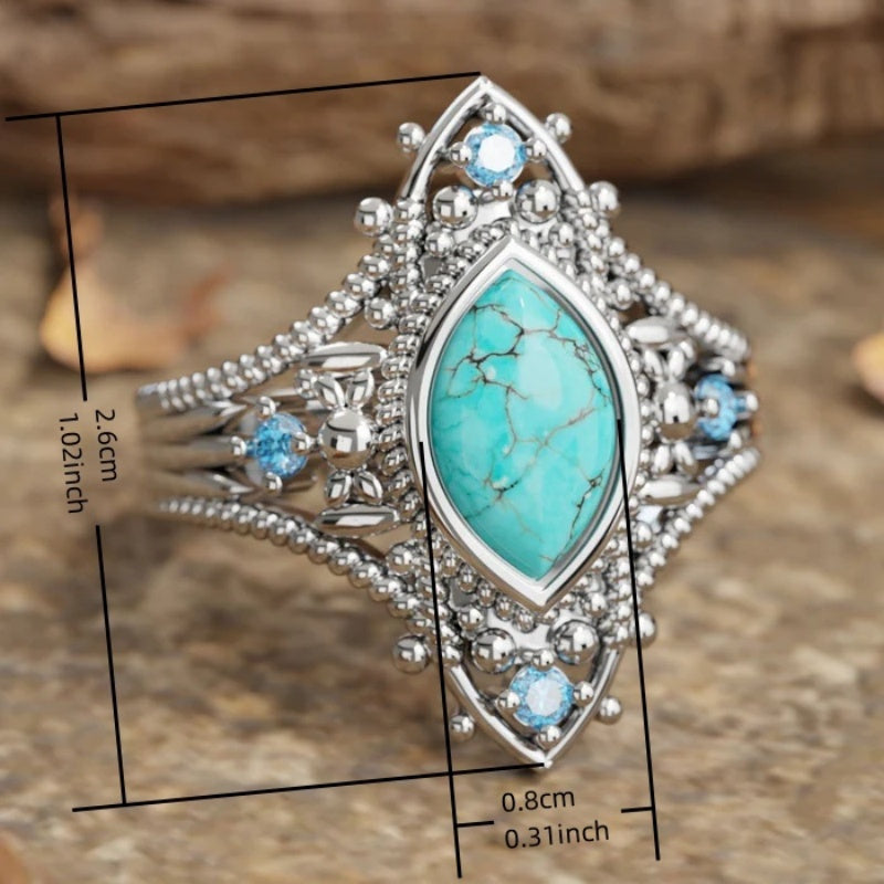 Zilveren vintage ring met marquise turkoois en blauwe steentjes