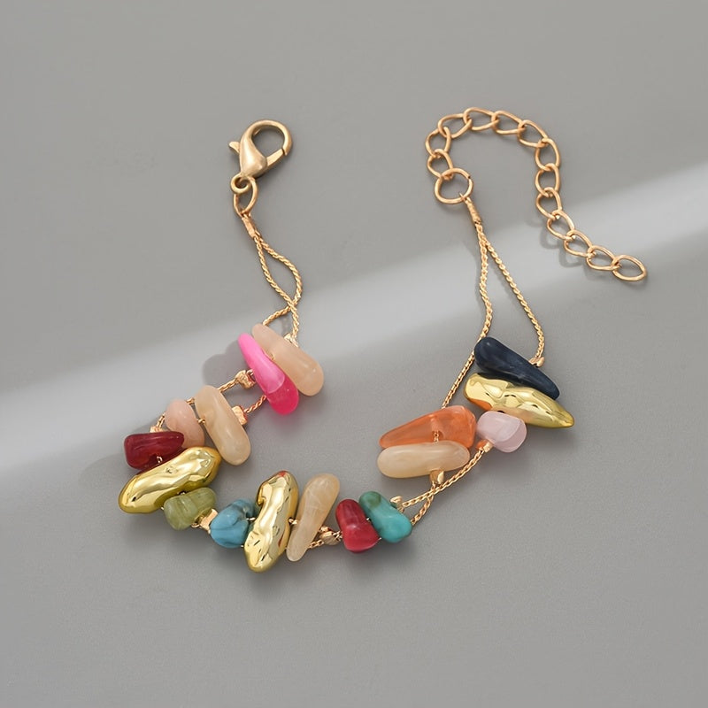 Gouden armband met kleurrijke natuursteen chips