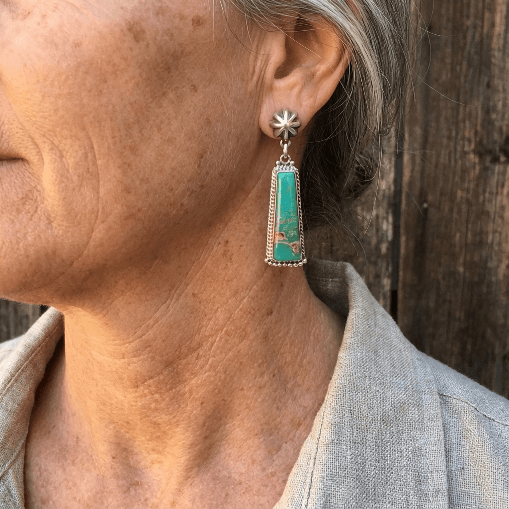 Zilveren oorbellen met turquoise staaf