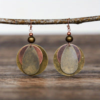 Bohemian oorbellen met ronde en druppelvormige schijfjes