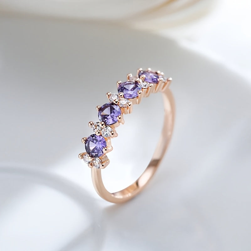 Roségouden ring met paarse en witte zirkonia