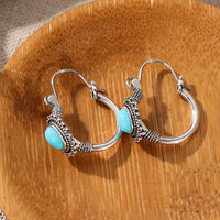 Bohemian ketting met turquoise kralen en druppelhanger