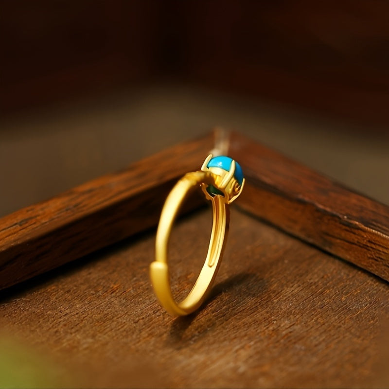Gouden vintage ring met turquoise edelsteen