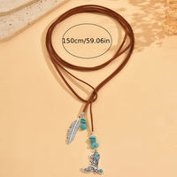 Bohemian ketting met turkooizen kralen en veerhanger