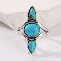 Zilveren ring met drie turquoise edelstenen