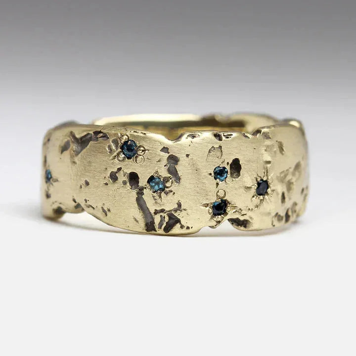 Zilveren brede ring met gouden band en steentje