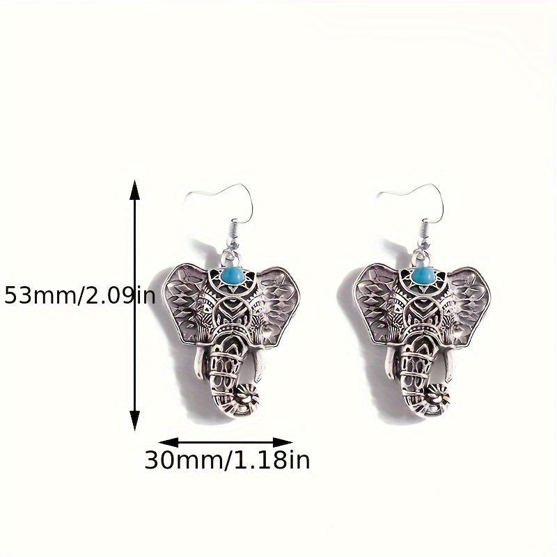 Zilveren boho olifant oorbellen met turquoise