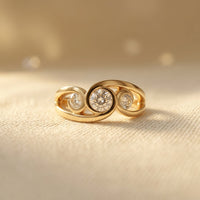 Gouden ring met groene emaille panelen