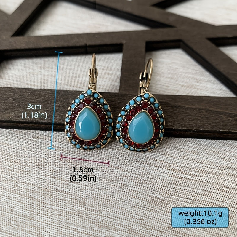 Bohemian bronzen oorbellen met turkoois en rode strass