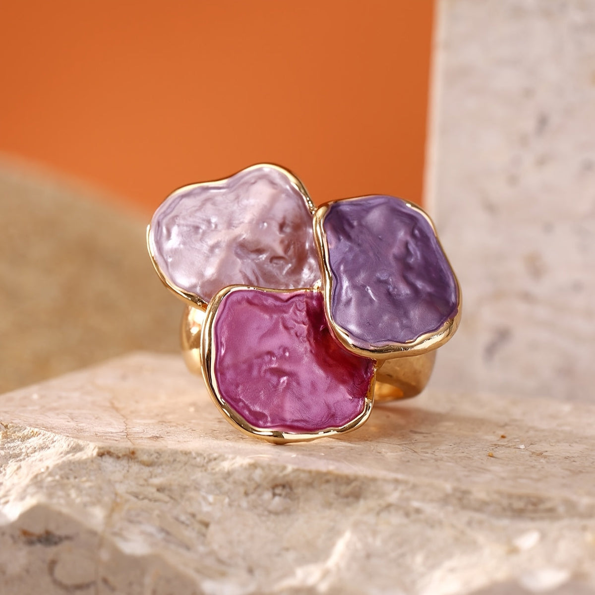 Roségouden ring met roze en paarse edelstenen