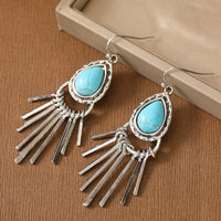 Zilveren bohemian oorbellen met turquoise en franjes
