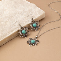 Zilveren bloemenset ketting en oorbellen met turquoise
