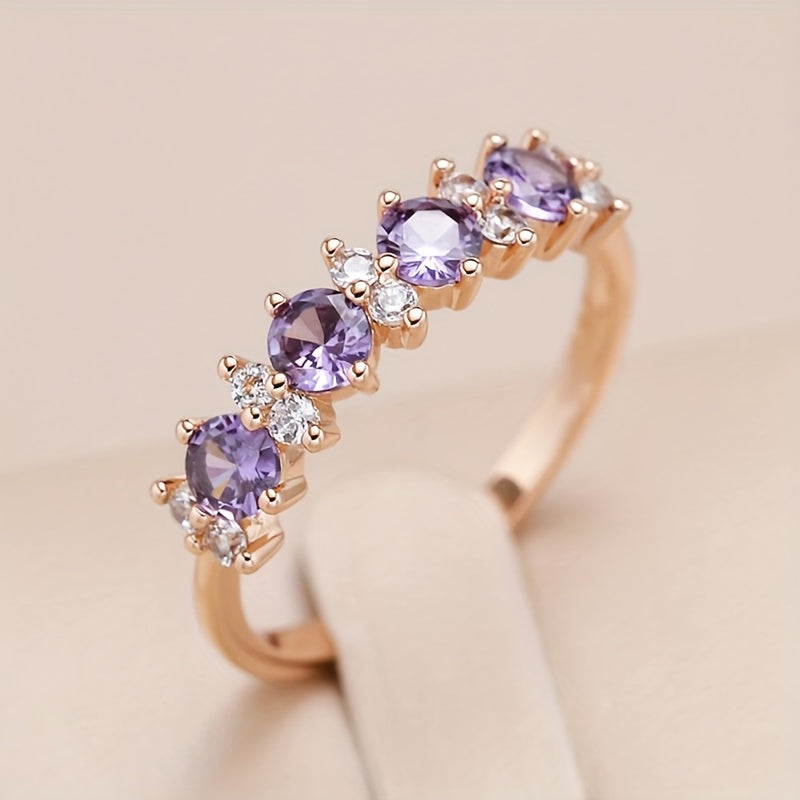 Roségouden ring met paarse en witte zirkonia