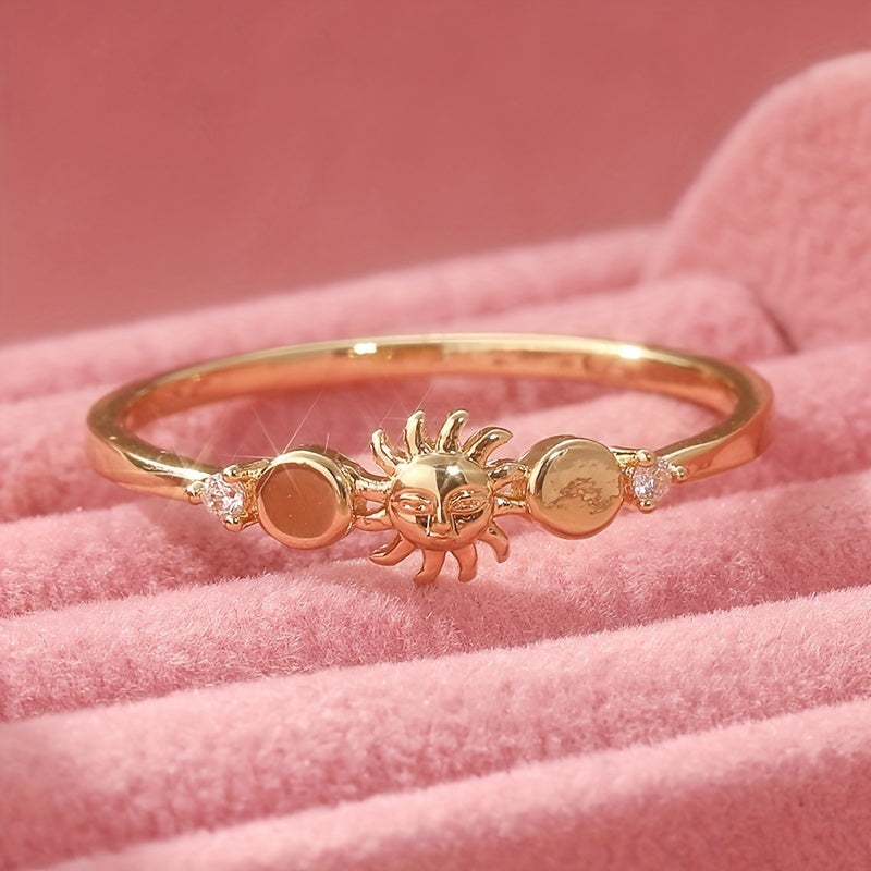 Gouden ringenset met zon, maan en sterren