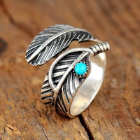 Zilveren veerring met turquoise