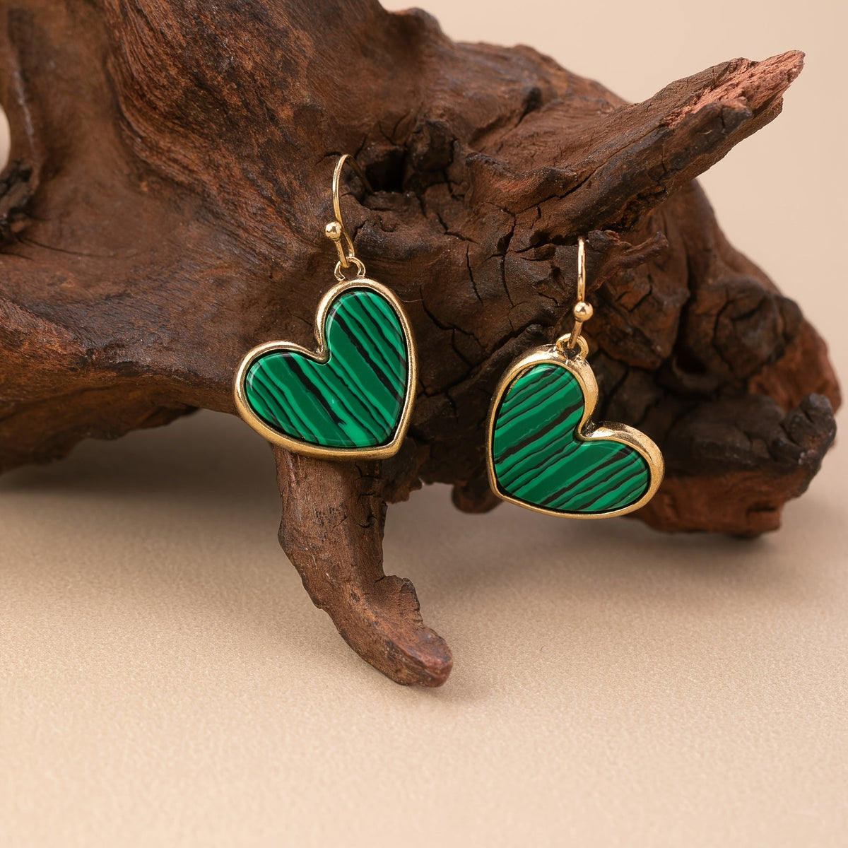 Gouden oorbellen met turquoise hart