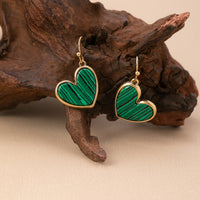 Gouden oorbellen met turquoise hart