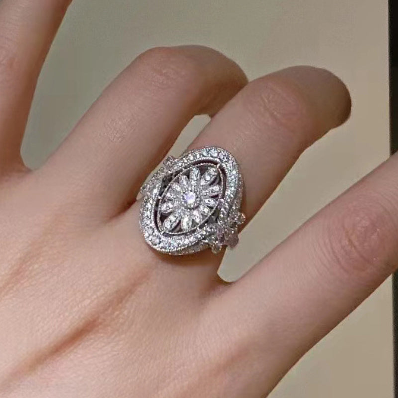Zilveren vintage ovale ring met zirkonia bloemmotief