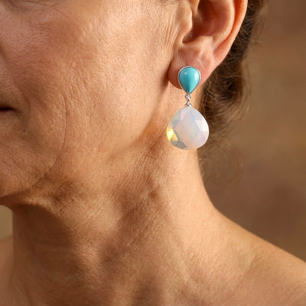 Zilveren oorbellen met turquoise en witte opaal