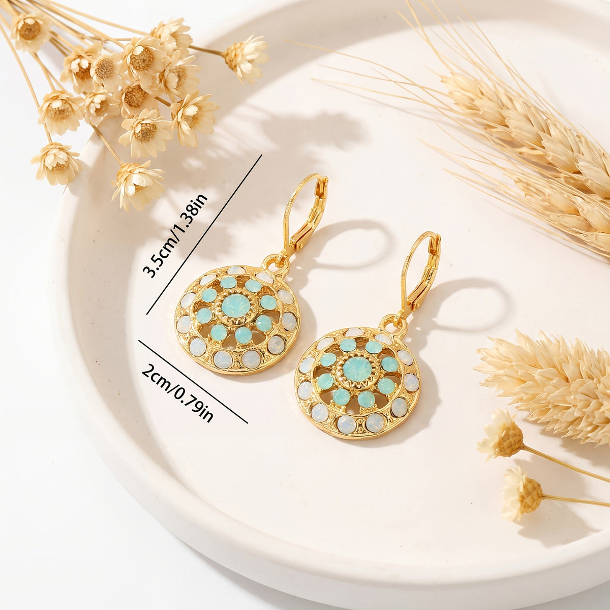 Gouden bohemian oorbellen met mozaïek mandala