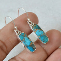 Zilveren oorbellen met rechthoekige turquoise steen