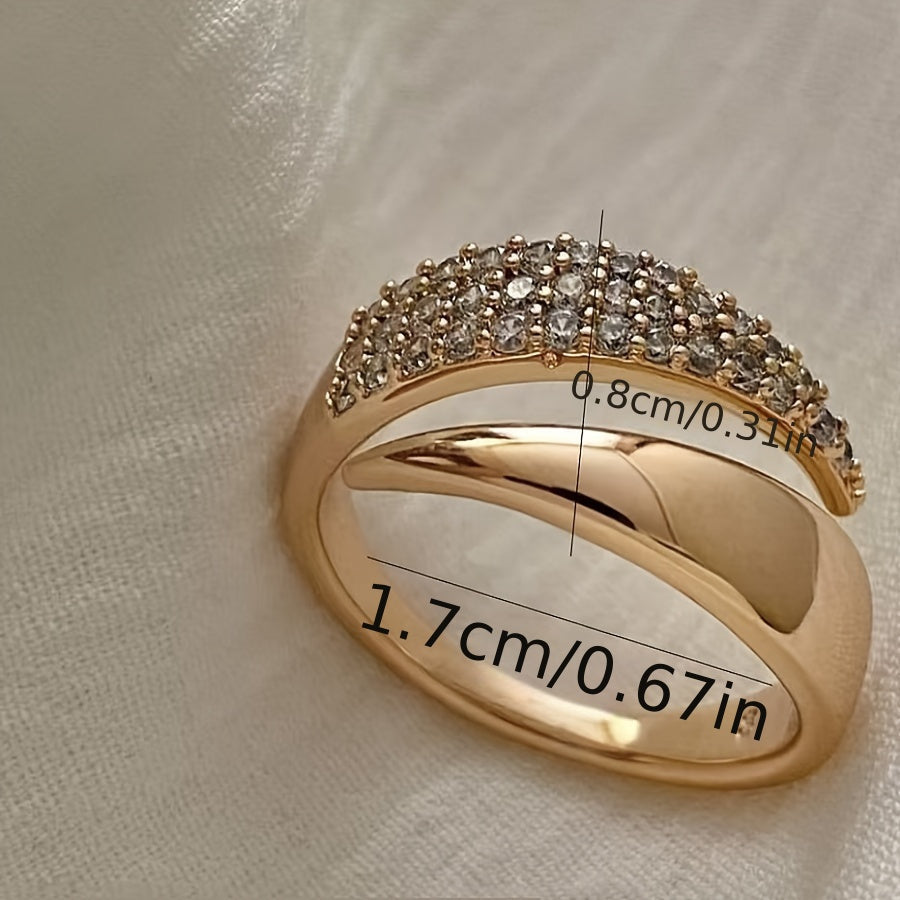Gouden wikkelring met pavé kristallen