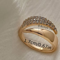 Gouden wikkelring met pavé kristallen