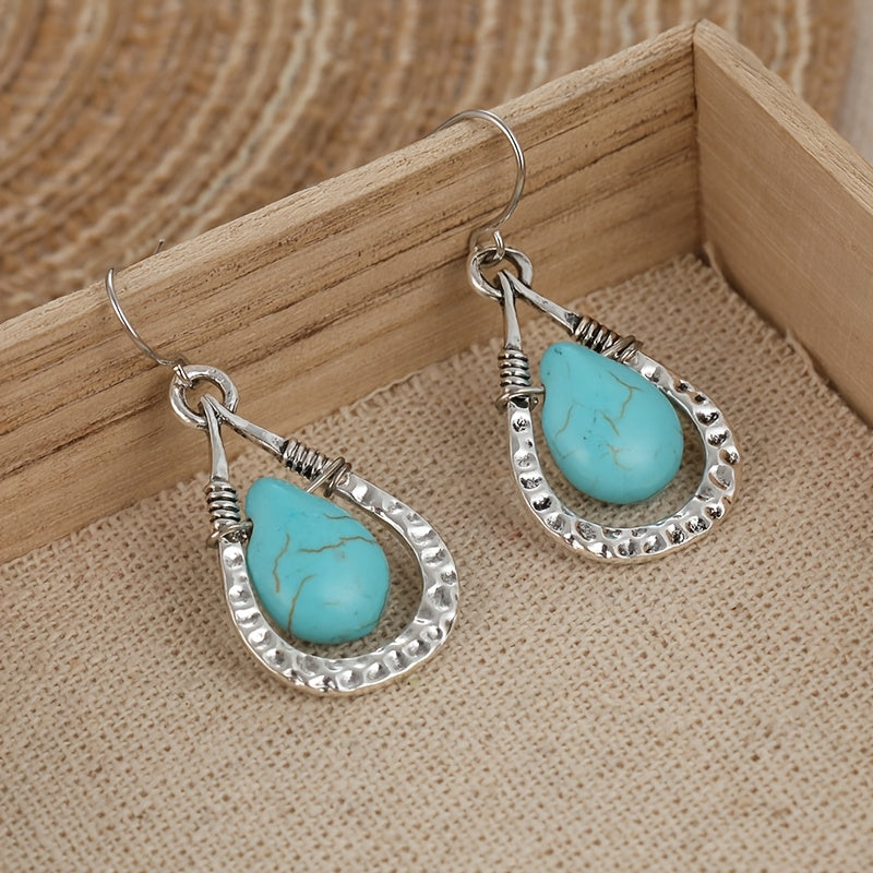 Zilveren oorbellen met wire-wrapped turquoise druppel