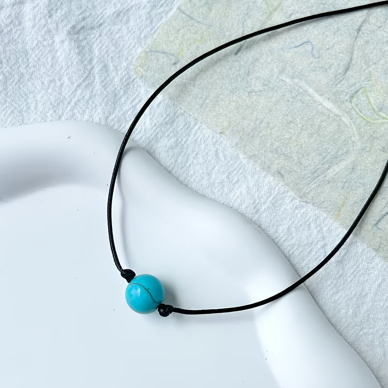 Bohemian lariat ketting van bruin koord met turkooizen kralen