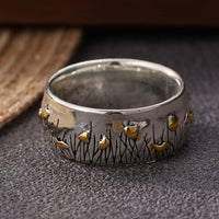 Zilveren vintage ring met gouden vogels en bladeren
