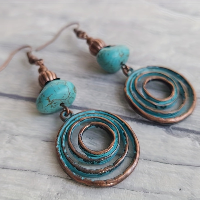 Bohemian oorbellen met roségoud spiraal en turquoise
