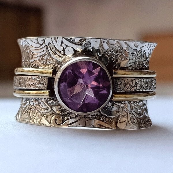 Zilveren spinner ring met amethist