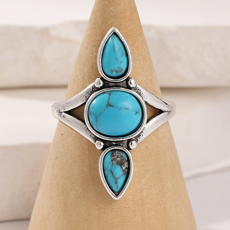 Zilveren ring met drie turquoise edelstenen
