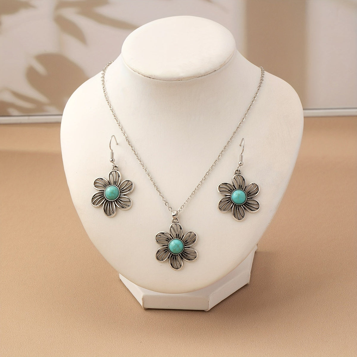 Zilveren bloemenset ketting en oorbellen met turquoise